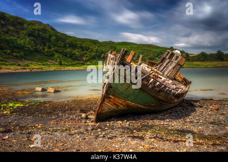 Old boat in Ardvasar harbour, Isle of Skye, Scotland Stock Photo