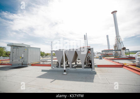 Air vents on the roof of building in functional and operational condition. Stock Photo