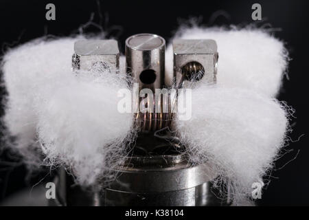 vaping coil with cotton for an electronic cigarette, e cig, e cigarette  Stock Photo - Alamy