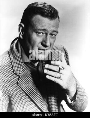 JOHN WAYNE SMOKING Stock Photo