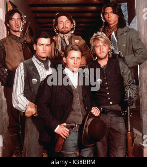 YOUNG GUNS L-R, DERMOT MULRONEY, CHARLIE SHEEN, CASEY SIEMASZKO, EMILIO ESTEVEZ, KIEFER SUTHERLAND, LOU DIAMOND PHILLIPS Stock Photo