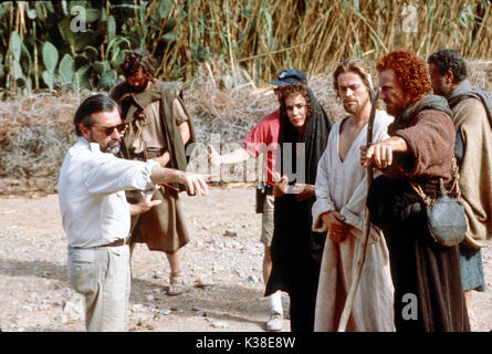 THE LAST TEMPTATION OF CHRIST UNIVERSAL PICTURES MARTIN SCORSESE, director, left. right foreground, l-r: BARBARA HERSHEY, WILLEM DAFOE, HARVEY KEITEL   THE LAST TEMPTATION OF CHRIST UNIVERSAL PICTURES MARTIN SCORSESE, director, left. right foreground, l-r: BARBARA HERSHEY, WILLEM DAFOE, HARVEY KEITEL     Date: 1988 Stock Photo