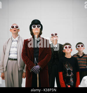 CHARLIE AND THE CHOCOLATE FACTORY ADAM GODLEY as Mr Teavee, JOHNNY DEPP as Willy Wonka, DAVID KELLY as Grandpa Joe, JORDAN FRY as Mike Teavee, FREDDIE HIGHMORE as Johnny Depp     Date: 2005 Stock Photo