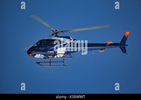 AS 350 B2 Ecureuil manufactured by French Aerospatiale over Aiguille du Midi Stock Photo