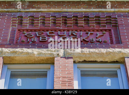 Nineteenth century brick building facade with limestone Stock Photo