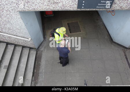 two men meeting in a subway Stock Photo