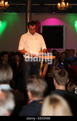 Munich, Germany. 01st Sep, 2017. Cem Özdemir writing. Credit: Alexander Pohl/Pacific Press/Alamy Live News Stock Photo