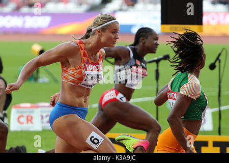 Kelly-Ann BAPTISTE (Trinidad and Tobago), Dafne SCHIPPERS (Netherlands, Holland), Marie-Josée TA LOU (Côte d'Ivoire, Ivory Coast) crossing the finish line in the Women's 100m Semi-Final 1 at the 2017, IAAF World Championships, Queen Elizabeth Olympic Park, Stratford, London, UK. Stock Photo