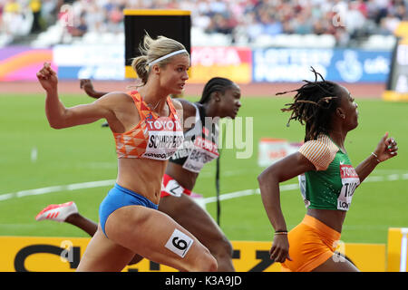 Kelly-Ann BAPTISTE (Trinidad and Tobago), Dafne SCHIPPERS (Netherlands, Holland), Marie-Josée TA LOU (Côte d'Ivoire, Ivory Coast) crossing the finish line in the Women's 100m Semi-Final 1 at the 2017, IAAF World Championships, Queen Elizabeth Olympic Park, Stratford, London, UK. Stock Photo