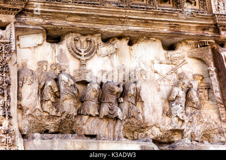 Titus Arch Roman Loot Menorah Temple Jerusalem Forum Rome Italy.  Stone arch was erected in 81 AD in honor of Emperor Vespasian and his son Titus for  Stock Photo