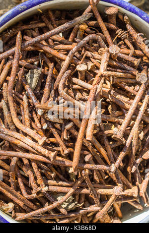 Old rusty iron nails of different sizes Stock Photo
