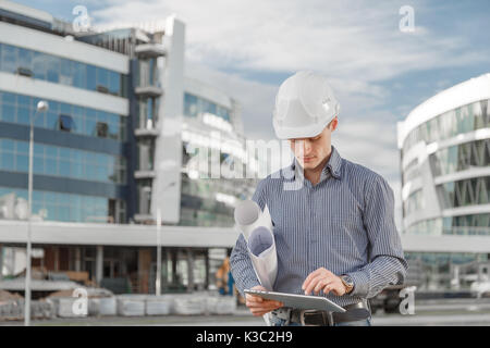 The concept of using new technologies as an engineer in the construction industry. Stock Photo