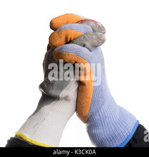 Isolated workers hands shaking hands and wearing gloves. Stock Photo