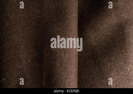 Crumpled felt fabric texture of natural brown fabric, cloth and furniture background. Stock Photo