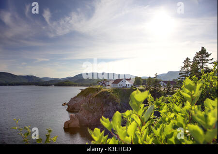 sun setting over the historic Keltic Lodge in Cape breton, Nova Scotia Stock Photo