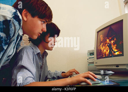 two boys playing computer games Stock Photo