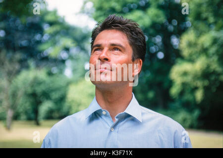 Man looks upwards Stock Photo