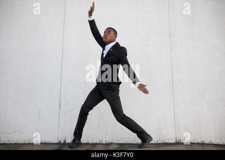 Young Adult Man in Dance Pose Stock Photo