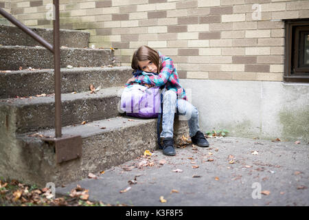 primary student depress at the school Stock Photo