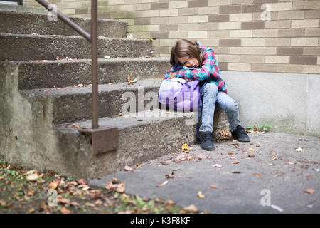 primary student depress at the school Stock Photo