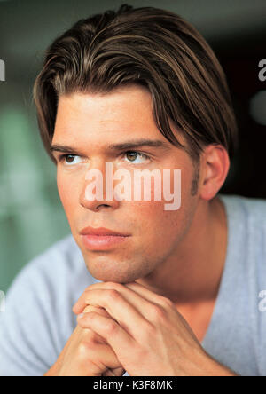 Pensive young man Stock Photo