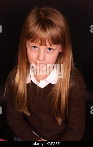 sad pout face little girl Stock Photo