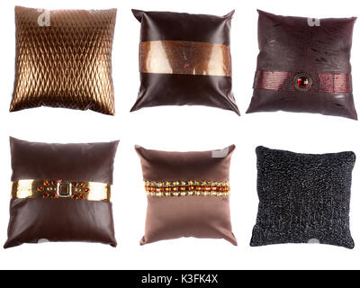A set of beautiful designer pillows with inticrate designs, on white studio background Stock Photo