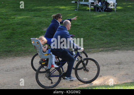 Stamford, UK. 02nd Sep, 2017. Mike & Mia Tindall cycling around the Cross Country Course at the 2017 Land Rover Burghley Horse Trials, Stamford, United Kingdom. 2nd Sep, 2017. Credit: Jonathan Clarke/Alamy Live News Stock Photo