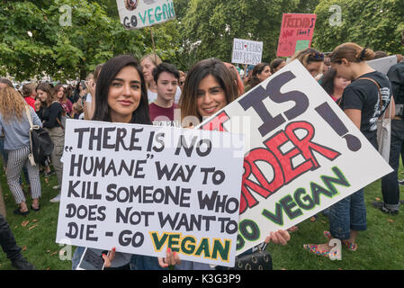 London , UK. 2nd September 2017. Woman with posters at the start of the vegan march from Hyde Park through London demanding an end to all animal oppression in the 2017 Official Animal Rights March, supported by The Save Movement and HeartCure Collective. Many carried posters or placards calling for an end to regarding animals as food or sources of wool and fur, and there were some dressed as animals. Peter Marshall/Alamy Live News Stock Photo