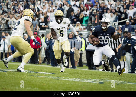 University Park, Pennsylvania, USA. 2nd Sep, 2017. September 02, 2017: Penn State Nittany Lions running back Saquon Barkley (26) rushes during the NCAA football game between Penn State Nittany Lions and Akron Zips at Beaver Stadium in University Park, Pennsylvania. Credit: Scott Taetsch/ZUMA Wire/Alamy Live News Stock Photo