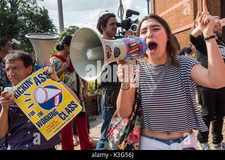 London, UK. 2nd September 2017. A student who took a leading role in the successful campaign by  United Voices of the World by cleaners at the LSE leads some chanting at the rally outside McDonald's London HQ.  McDonald's workers are holding the first UK strike against the company on Monday, US Labor Day, calling for an end to zero hours contracts, £10 an hour and union recognition. Credit: Peter Marshall/Alamy Live News Stock Photo