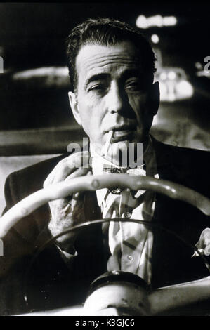 IN A LONELY PLACE HUMPHREY BOGART     Date: 1950 Stock Photo