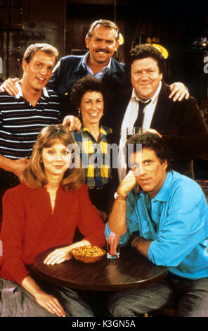 CHEERS CHEERS [Clockwise from bottom left] SHELLEY LONG as Diane Chambers, WOODY HARRELSON as Woody Boyd, JOHN RATZENBERGER as Cliff Clavin, GEORGE WENDT as Norm Peterson, TED DANSON as Sam Malone, [centre] RHEA PERLMAN as Carla Tortelli Stock Photo