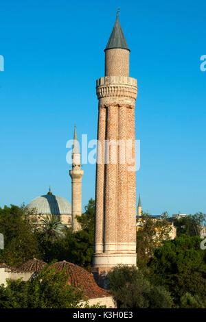 Turkey, Antalya, Alaaddin mosque close the Yivli Minare, on the left behind it dome and minaret of the Tekeli Mehmet Pasa Moschee Stock Photo