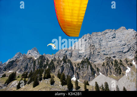 Paraglider in front of Chur ridges, Walensee, aerial picture, canton St. Gallen, Switzerland Stock Photo