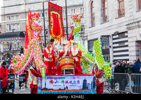 England, London, Chinatown, Chinese New Year Parade, Festival Float and Spectators Stock Photo