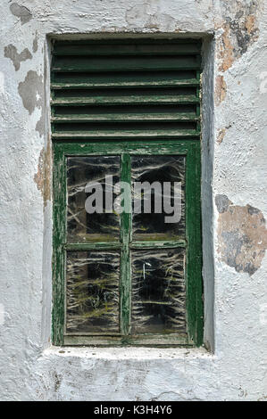 Symbol / Concepts, Overgrown with cobwebs old window Stock Photo