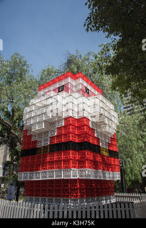 SYDNEY,NSW,AUSTRALIA-NOVEMBER 20,2016: Large milk crate Santa Claus sculpture with greenery under a clear blue sky in Sydney, Australia Stock Photo