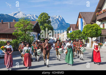 Germany, Bavaria, Garmisch-Partenkirchen, Bavarian Festival, Marching Band in Traditional Costume Stock Photo