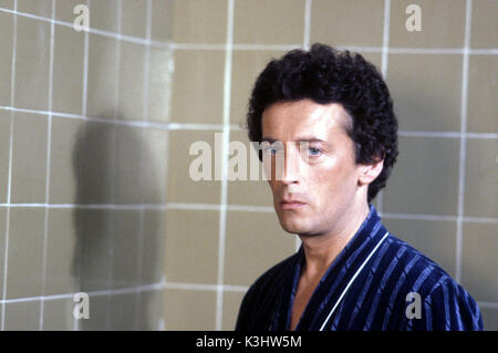 THE JIGSAW MAN ROBERT POWELL     Date: 1983 Stock Photo