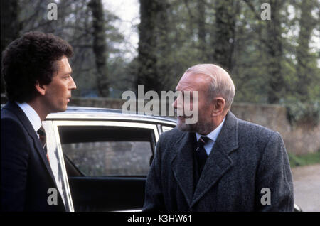 THE JIGSAW MAN ROBERT POWELL, JIGSAW MAN     Date: 1983 Stock Photo