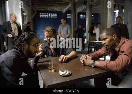 (L to R) JOHN ORTIZ as drug middleman Jose Yero, COLIN FARRELL as Detective Sonny Crockett and JAMIE FOXX as Detective Ricardo Tubbs square off in Miami Vice, the feature film crime drama that liberates what is adult, dangerous and alluring about working deeply undercover. MIAMI VICE JOHN ORTIZ as drug middleman Jos&#x9819;ero, COLIN FARRELL as Detective Sonny Crockett and JAMIE FOXX as Detective Ricardo Tubbs s (L to R) JOHN ORTIZ as drug middleman Jos&#x9819;ero, COLIN FARRELL as Detective Sonny Crockett and JAMIE FOXX as Detective Ricardo Tubbs square off in Miami Vic Stock Photo