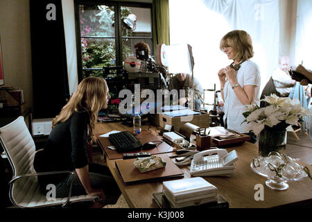 Kate Winslet and Director/Writer/Producer Nancy Meyers on the set of Columbia Pictures/Universal Pictures' romantic comedy The Holiday. THE HOLIDAY KATE WINSLET, Director NANCY MEYERS Kate Winslet (left) and Director/Writer/Producer Nancy Meyers on the set of Columbia Pictures/Universal Pictures romantic comedy The Holiday.     Date: 2006 Stock Photo