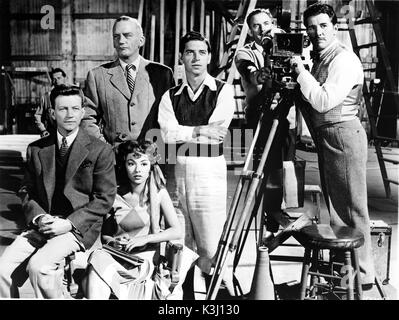 SINGIN' IN THE RAIN [US 1952]  [L-R] DONALD O'CONNOR, MILLARD MITCHELL, RITA MORENO, [?], [?], DOUGLAS FOWLEY Stock Photo