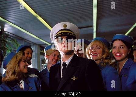 Catch Me If You Can.    Pictured: Frank Abagnale (LEONARDO DICAPRIO, center) surrounds himself with stewardesses, who have no trouble believing that he is an airline pilot in DreamWorks Pictures' CATCH ME IF YOU CAN,directed by Steven Spielberg.   CATCH ME IF YOU CAN [US 2002] LEONARDO DICAPRIO as Frank Abagnale surrounds himself with stewardesses     Date: 2002 Stock Photo