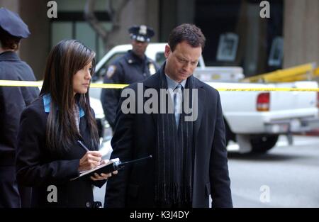 Til Death Do We Part CSI: NY. Photo: Patrick Ecclesine/ CBS Stars KELLY HU and GARY SINESE. Licensed by CHANNEL 5 BROADCASTING. Five Stills: 0207 550 5509. Free for editorial press and listings use in connection with the current broadcast of Channel 5 programmes only. This Image may only be reproduced with the prior written consent of Channel 5. Not for any form of advertising, internet use or in connection with the sale of any product. CSI: NY aka CSI: NEW YORK Series#1/Episode#15/Til Death Do We Part  KELLY HU as Det. Kaile Maka, GARY SINESE as Det. Mac Taylor T Stock Photo