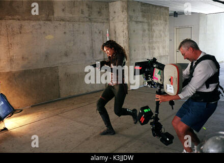 SERENITY GINA TORRES with steadicam operator SERENITY     Date: 2005 Stock Photo