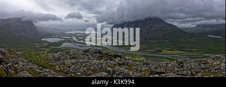 Panorama view from Nammatj with rain clouds in Rapadalen, Sarek National Park, Sweden Stock Photo