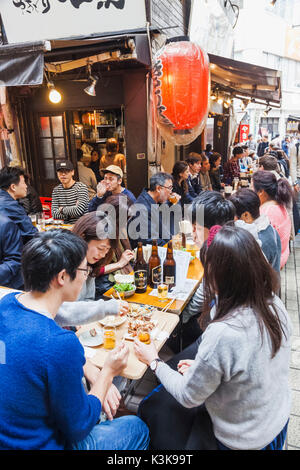 Japan, Hoshu, Tokyo, Ueno, Ameyoko Shopping Street, Street Food Dining Stock Photo