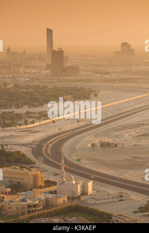 UAE, Dubai, Downtown Dubai, elevated desert and highway view towards Ras Al Khor, dawn Stock Photo
